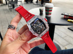 Richard Mille watch with red silicone strap and jeweled silver bezel