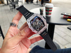 Richard Mille watch with black silicone strap and jeweled silver bezel