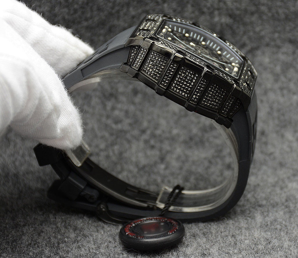 Richard Mille watch showing black textured metal bracelet and case side