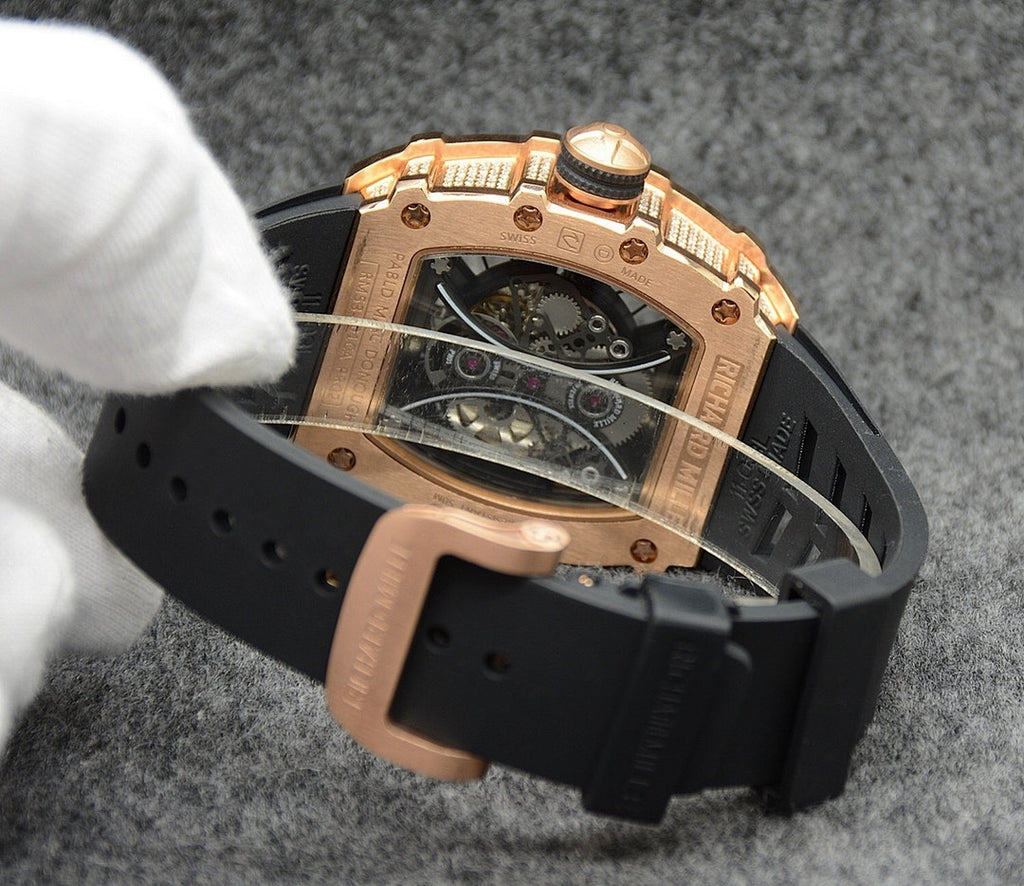 Richard Mille watch with rose gold case, visible movement through skeleton dial