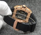 Richard Mille watch with rose gold case, visible movement through skeleton dial