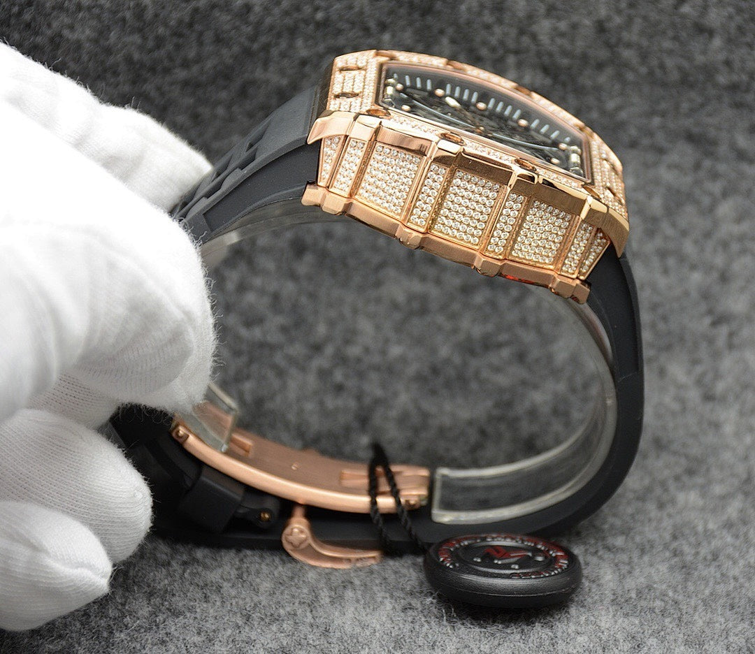 Richard Mille watch with rose gold metal bracelet and crown, black rubber band