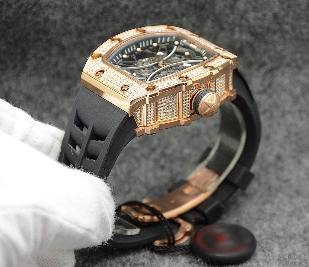 Richard Mille watch with rose gold case and jeweled bezel on black strap