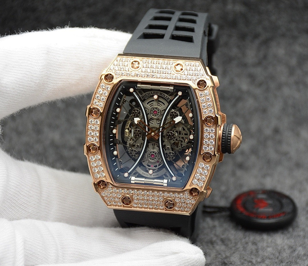 Richard Mille watch with rose gold case and jeweled bezel over blue skeleton dial
