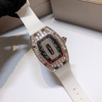 Richard Mille watch with white rubber strap and rose-gold gem-set case