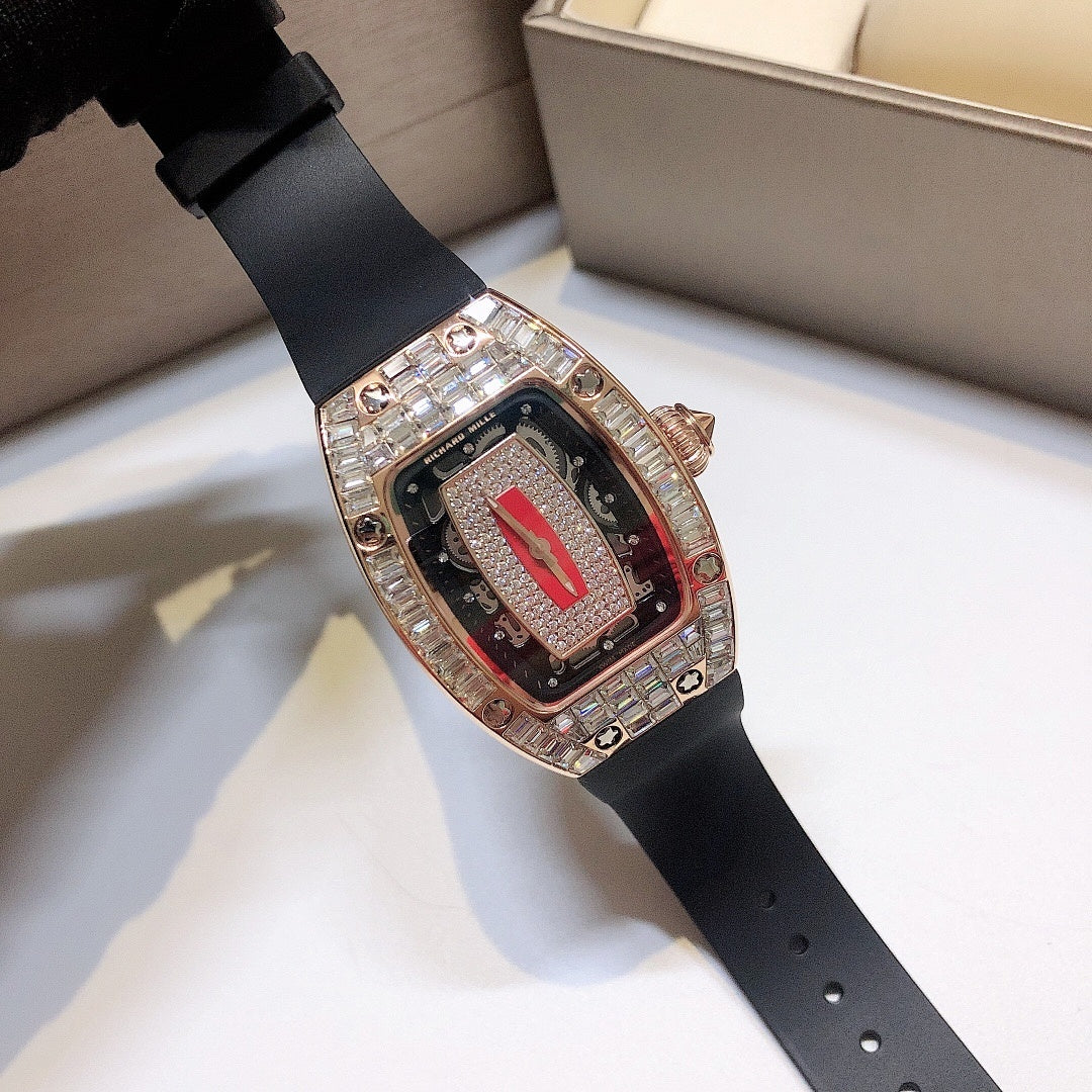 Richard Mille watch with black rubber strap and rose-gold gem-set bezel