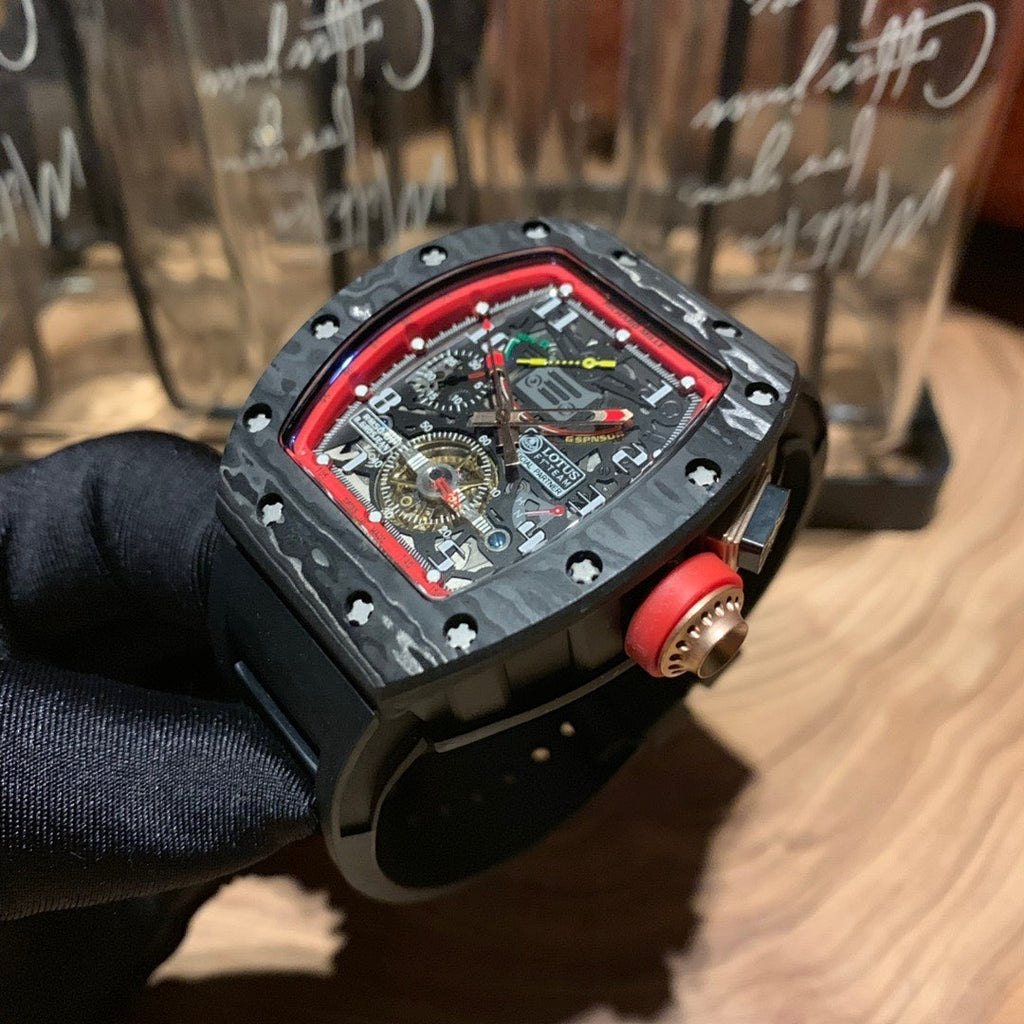Richard Mille watch side view, red bezel and crown detail, skeleton dial, black case and strap