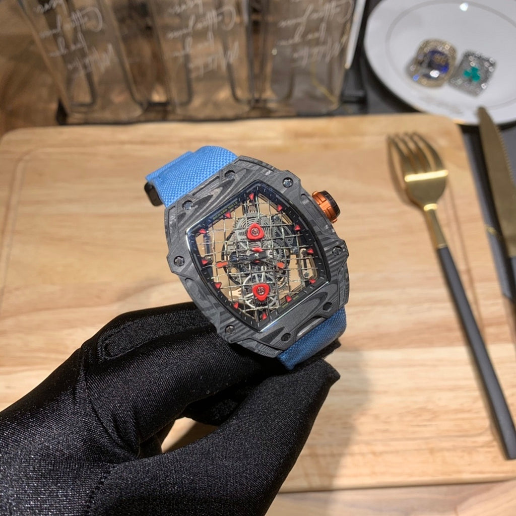 Richard Mille watch with blue fabric strap and angled open-work skeleton dial