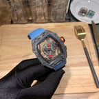 Richard Mille watch with blue fabric strap and angled open-work skeleton dial