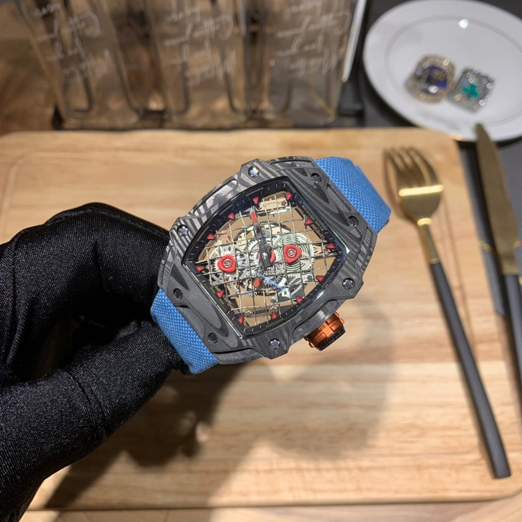 Richard Mille watch with blue fabric strap and dark square case, skeleton dial close-up