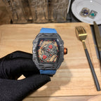 Richard Mille watch with blue fabric strap and open-work skeleton dial