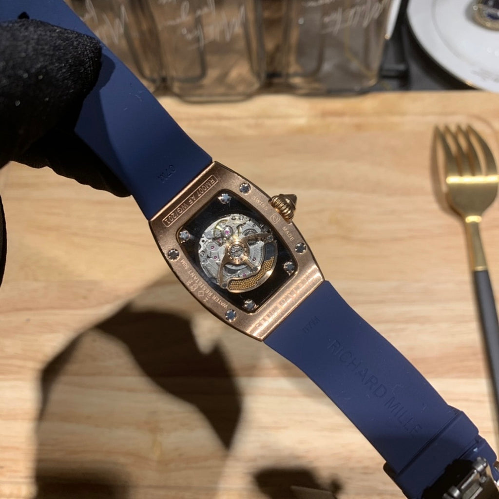 Richard Mille wristwatch caseback, diamond accents and skeleton movement, blue strap