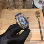 Richard Mille wristwatch, angled view, blue dial and rubber strap, diamond bezel