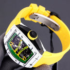 Sport watch with yellow rubber strap, silver case, green skeleton dial and black crown