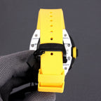 Sport watch with yellow rubber strap and black dial panel, side profile