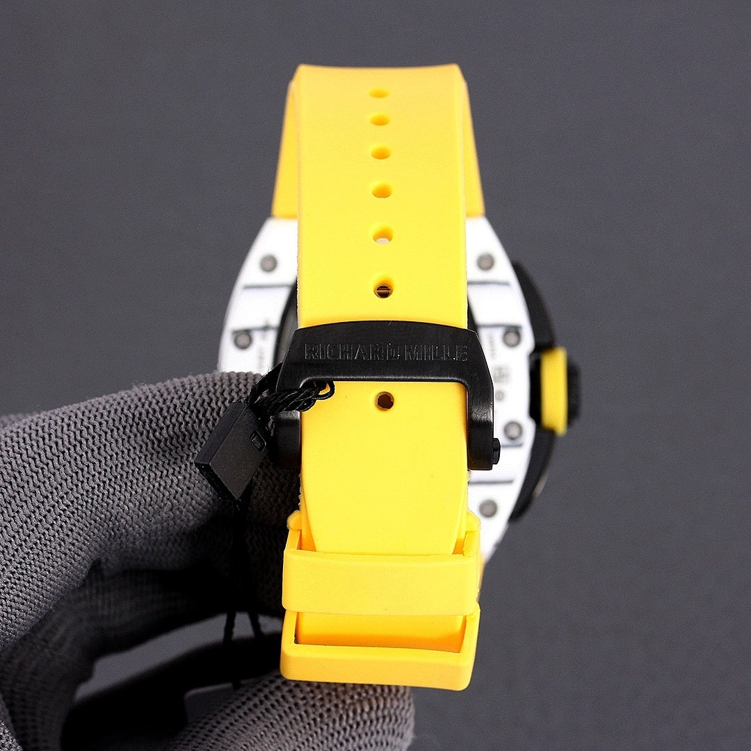 Sport watch with yellow rubber strap and black dial panel, side profile