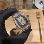 Diamond bezel luxury watch with black dial and black rubber strap