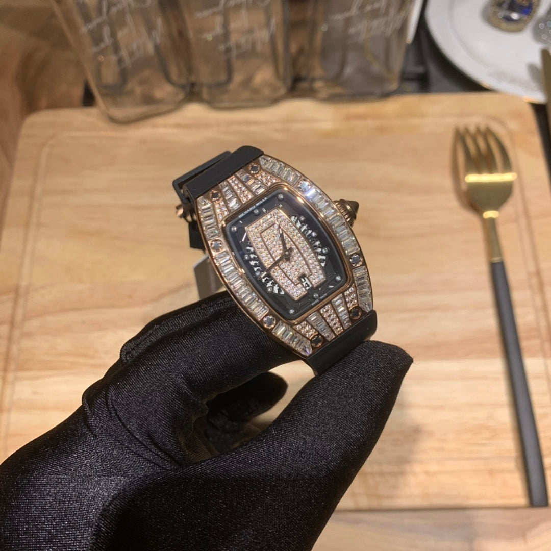 Jeweled square luxury watch with black dial on black rubber strap