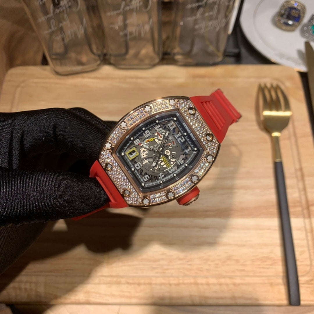 Red silicone wristwatch with detailed dial and jeweled bezel