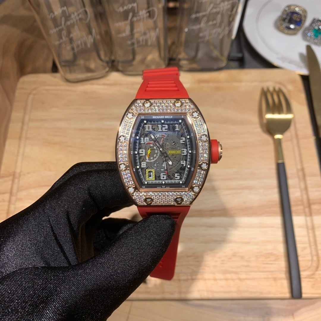 Richard Mille watch with red silicone strap and diamond bezel