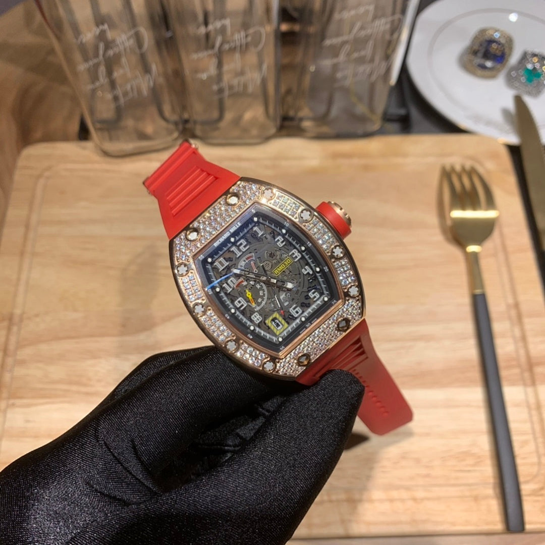 Red silicone wristwatch with blue dial and jeweled bezel