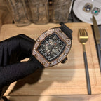 Richard Mille watch at an angle, jeweled bezel and dark skeleton-style dial on black strap