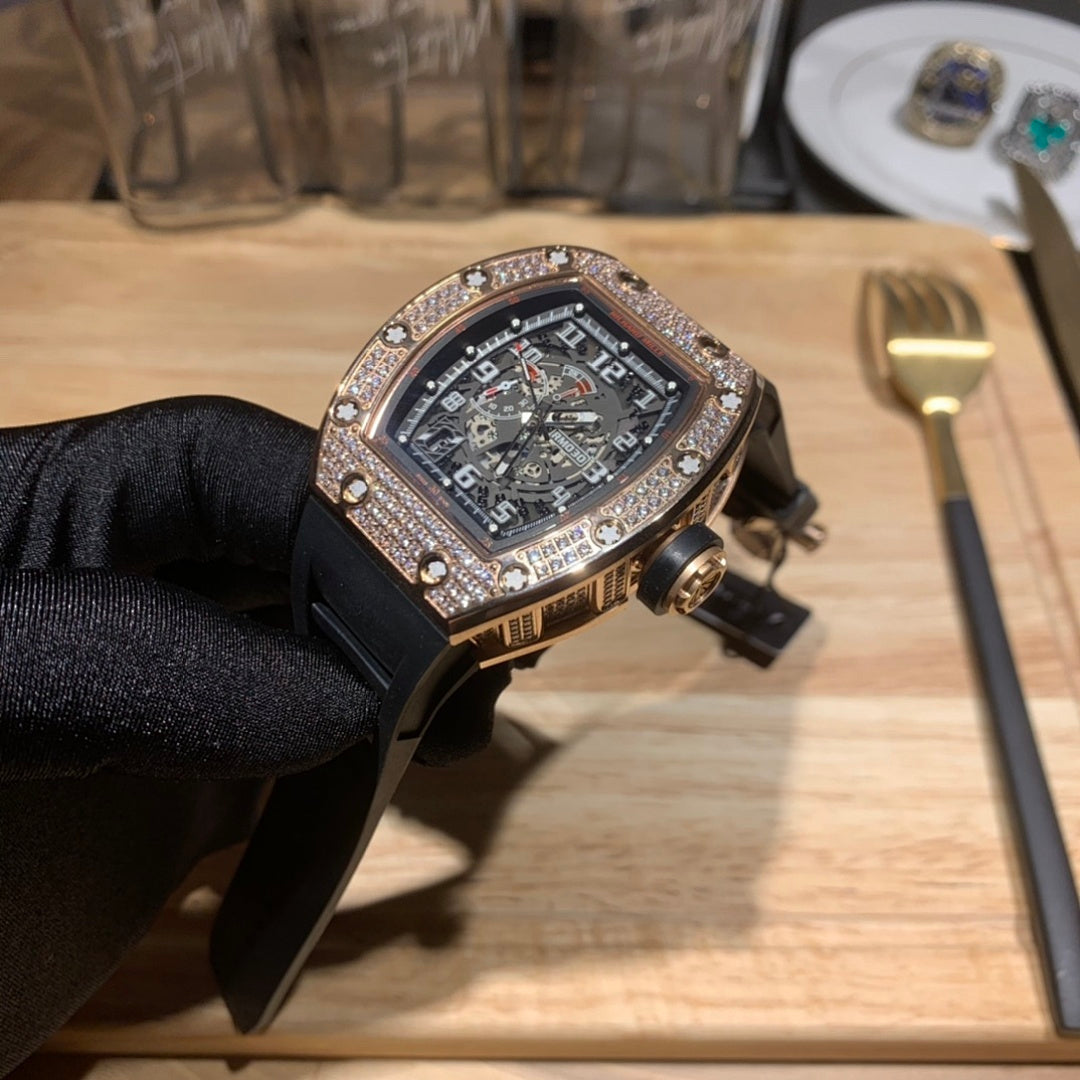 Richard Mille watch side view on black rubber strap with jeweled bezel and crown