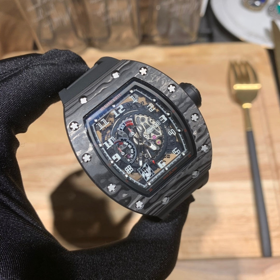 Richard Mille watch close-up with black bezel and skeleton dial detail under glass