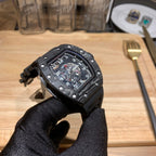 Richard Mille watch angled view with black strap and skeleton dial in black case