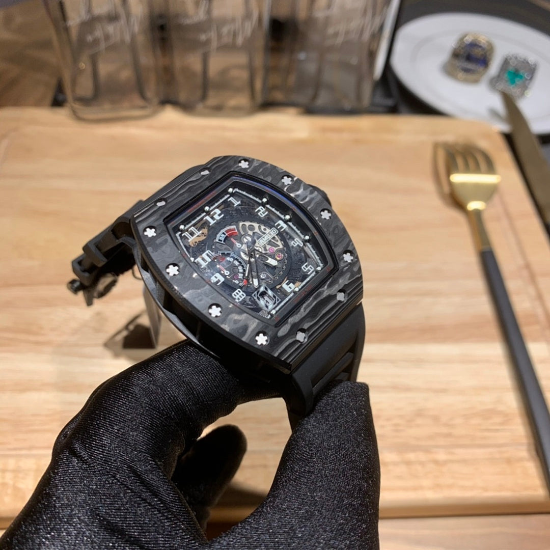 Richard Mille watch angled view with black strap and skeleton dial in black case