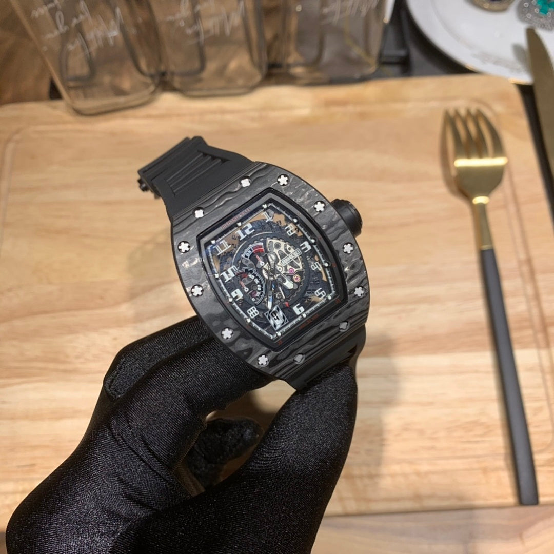 Richard Mille watch showing black cushion case, star-set bezel details, and skeleton dial
