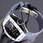 Richard Mille watch back view with light blue rubber strap and black hardware details.