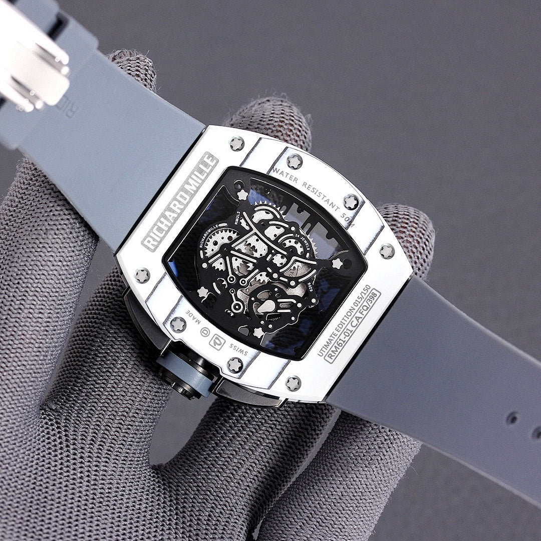 Richard Mille watch caseback with blue skeleton dial and stainless-toned screws on strap.