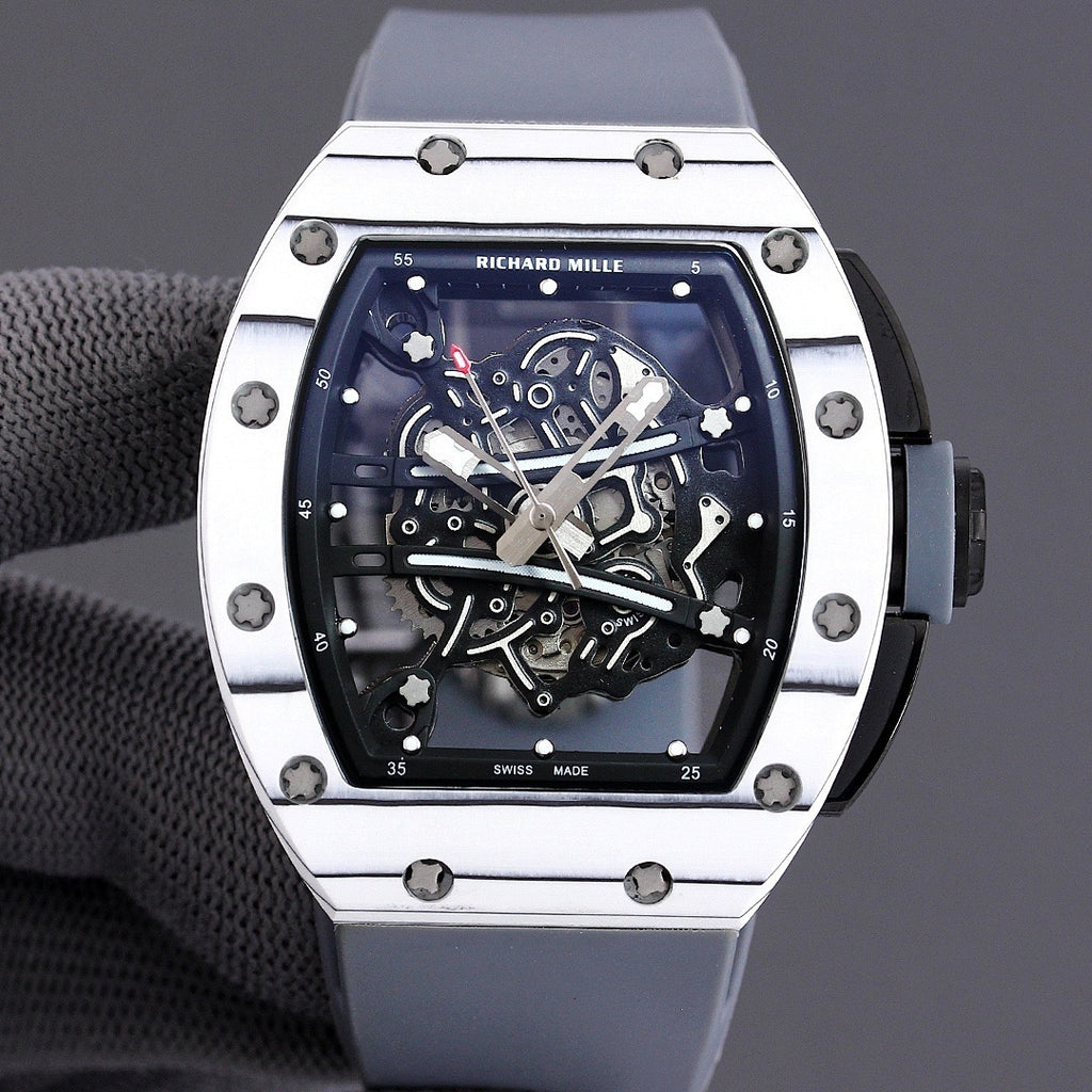 Richard Mille watch front view with white-toned bezel, blue skeleton dial, and light blue strap.