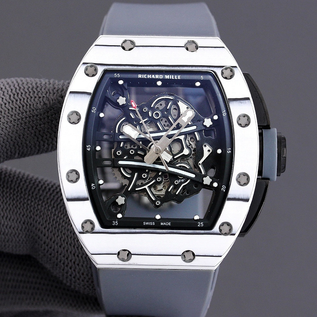 Richard Mille watch front view with white-toned bezel, blue skeleton dial, and light blue strap.