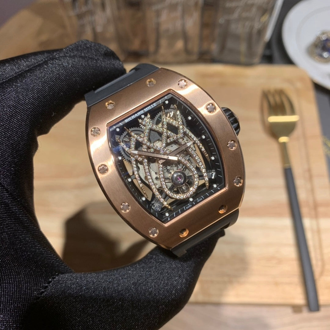 Richard Mille watch close-up with black rubber strap and rose gold-toned case