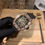 Richard Mille skeleton dial wristwatch with rose gold diamond bezel and black strap