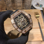 Richard Mille skeleton dial wristwatch in rose gold with diamond bezel and black strap