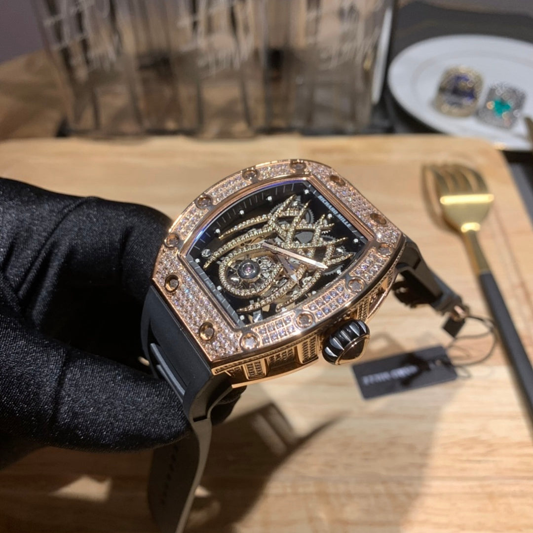 Richard Mille skeleton dial wristwatch, rose gold diamond bezel, black strap
