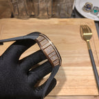 Richard Mille watch with diamond strap surround and black rubber band