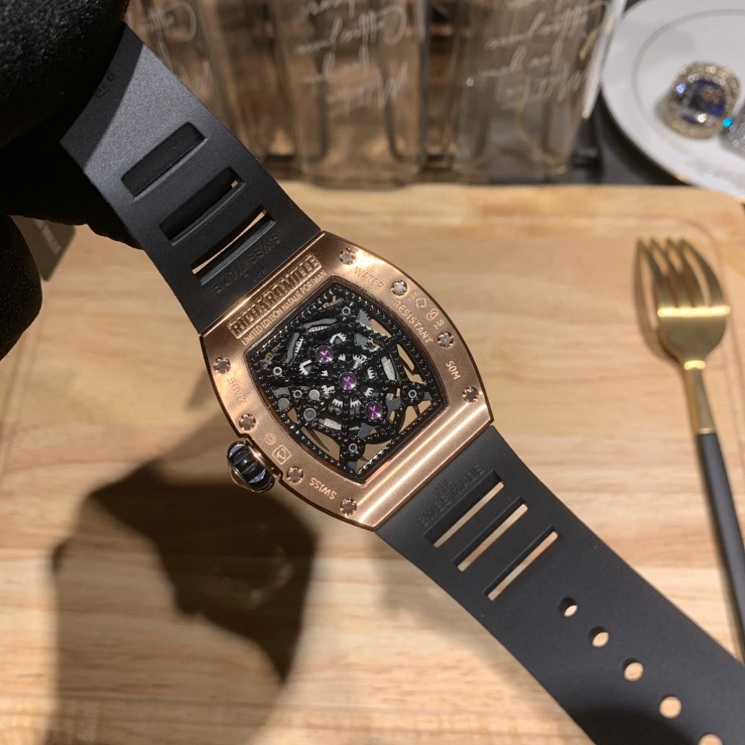 Richard Mille side view wristwatch with black rubber band and rose gold case