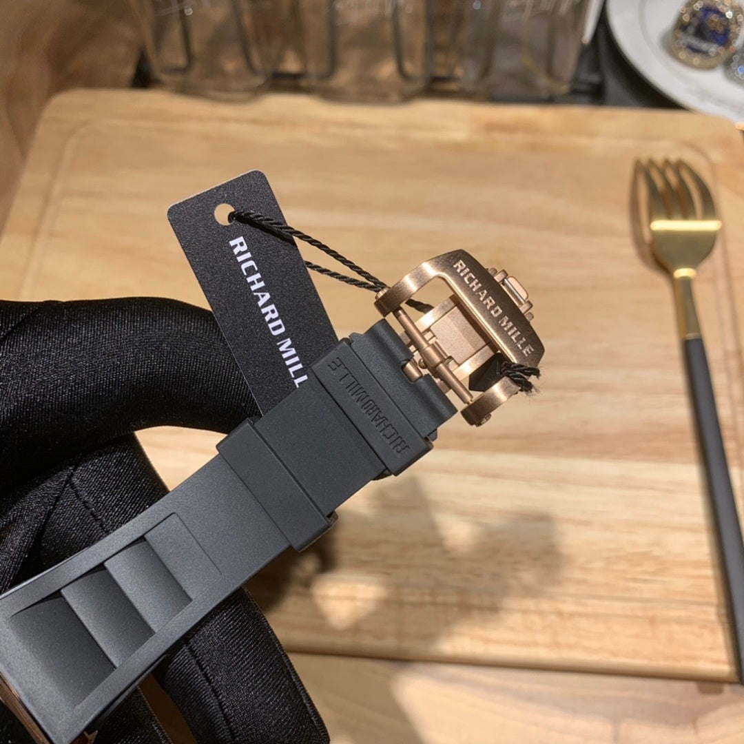 Richard Mille watch clasp and black rubber strap with rose gold hardware