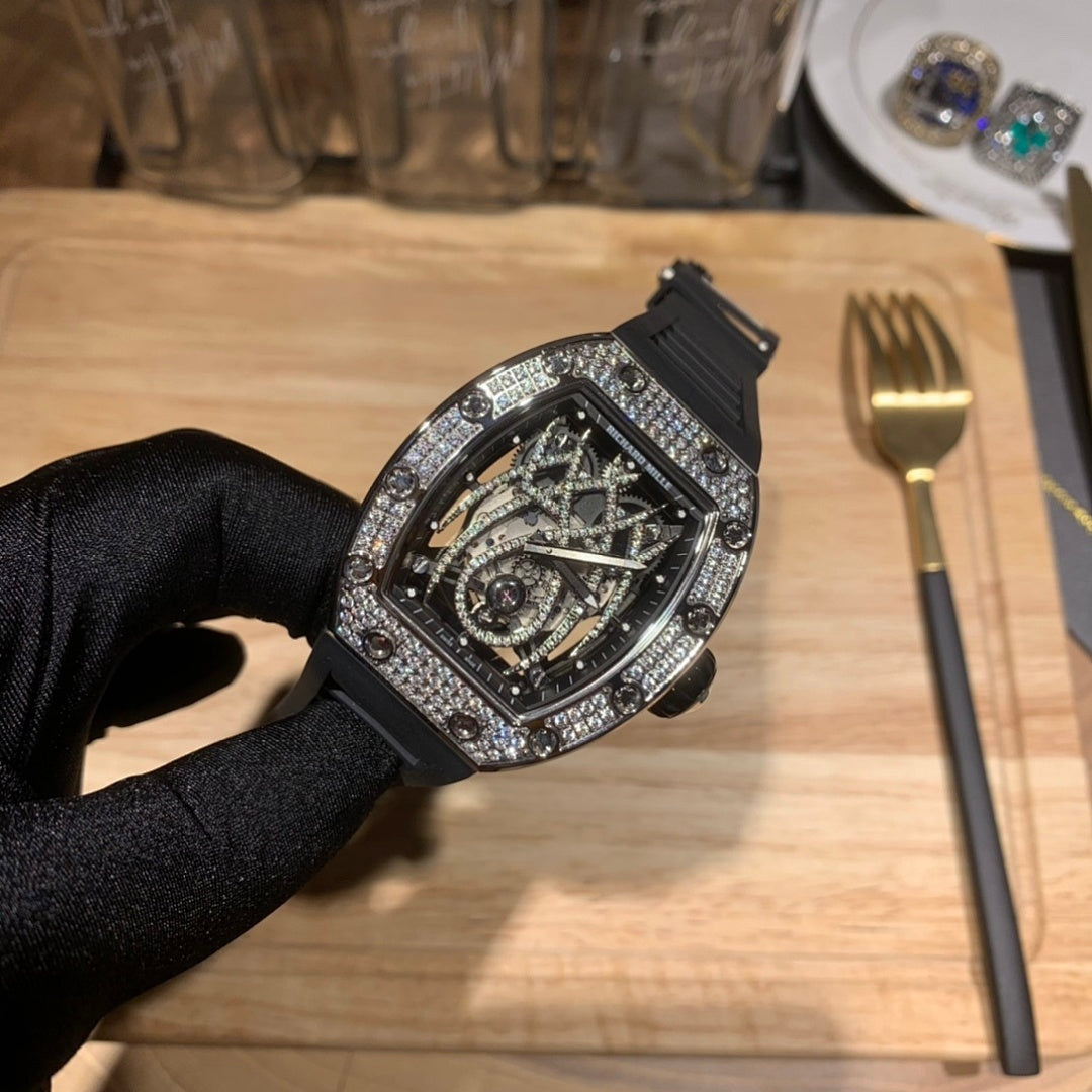 Richard Mille watch on black glove, black rubber strap, gem-set bezel, open-work dial