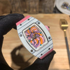 Richard Mille wristwatch close-up: silver bezel, pink strap, colorful dial with bezel screws