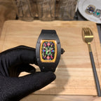 Black Richard Mille watch with multicolor skeleton dial on black rubber strap