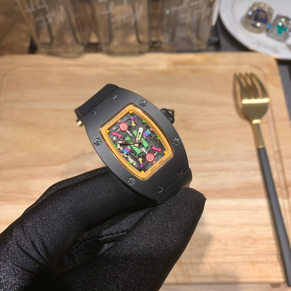 Black Richard Mille watch angled view, square bezel, multicolor skeleton dial