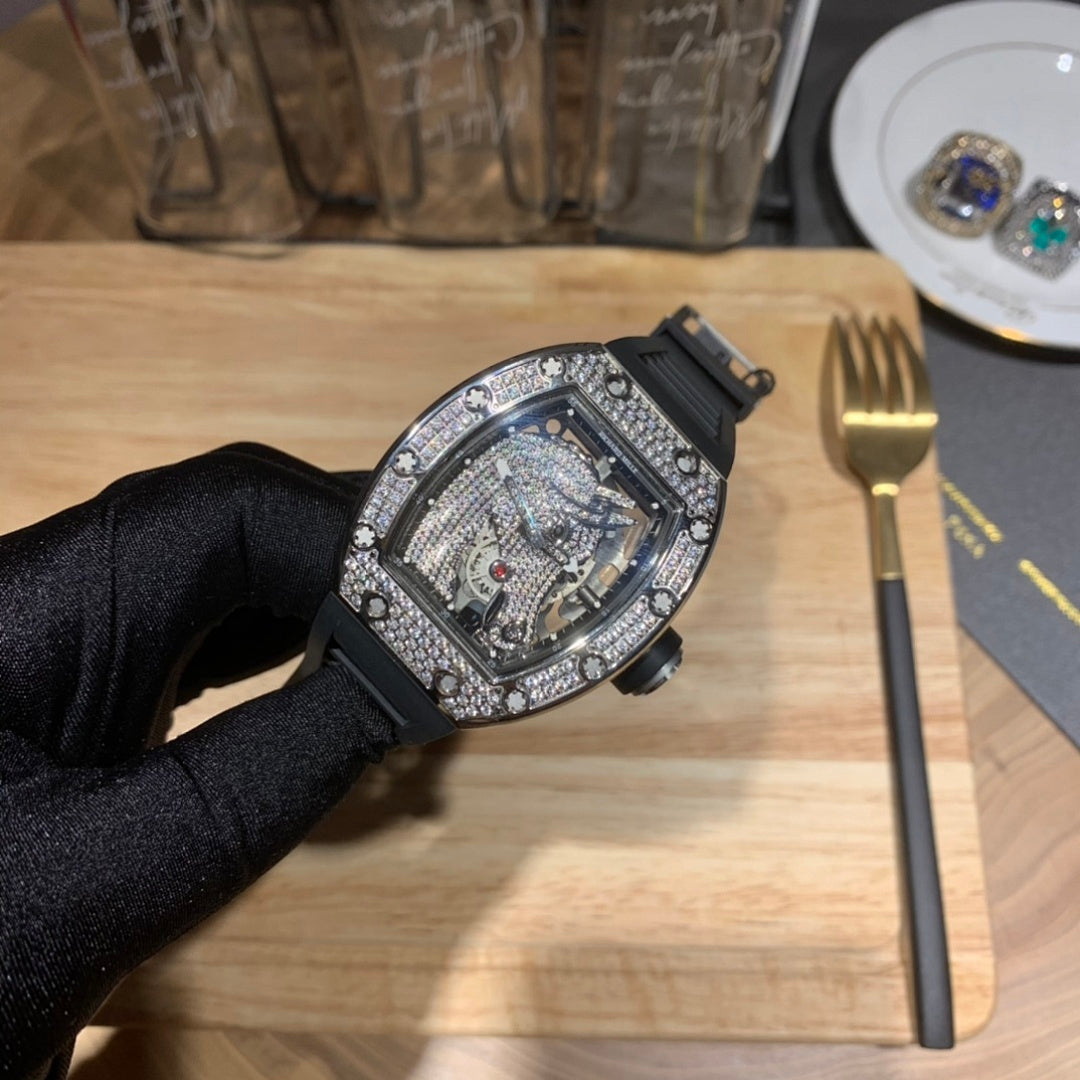 Richard Mille wristwatch angled view on black strap, jeweled case with open dial detail