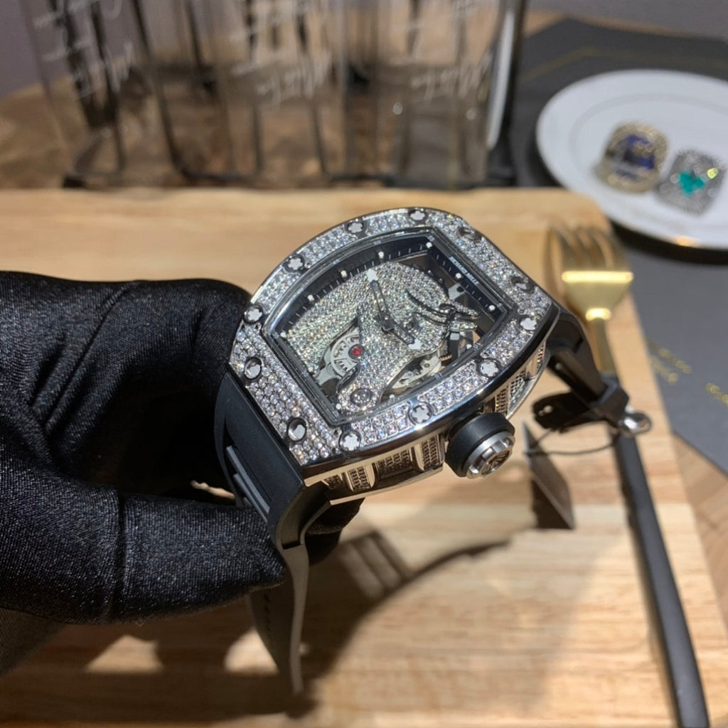 Richard Mille wristwatch tilted view, black case frame with sparkling diamond-studded bezel