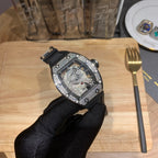 Richard Mille wristwatch side view, black rubber strap and sparkling silver bezel