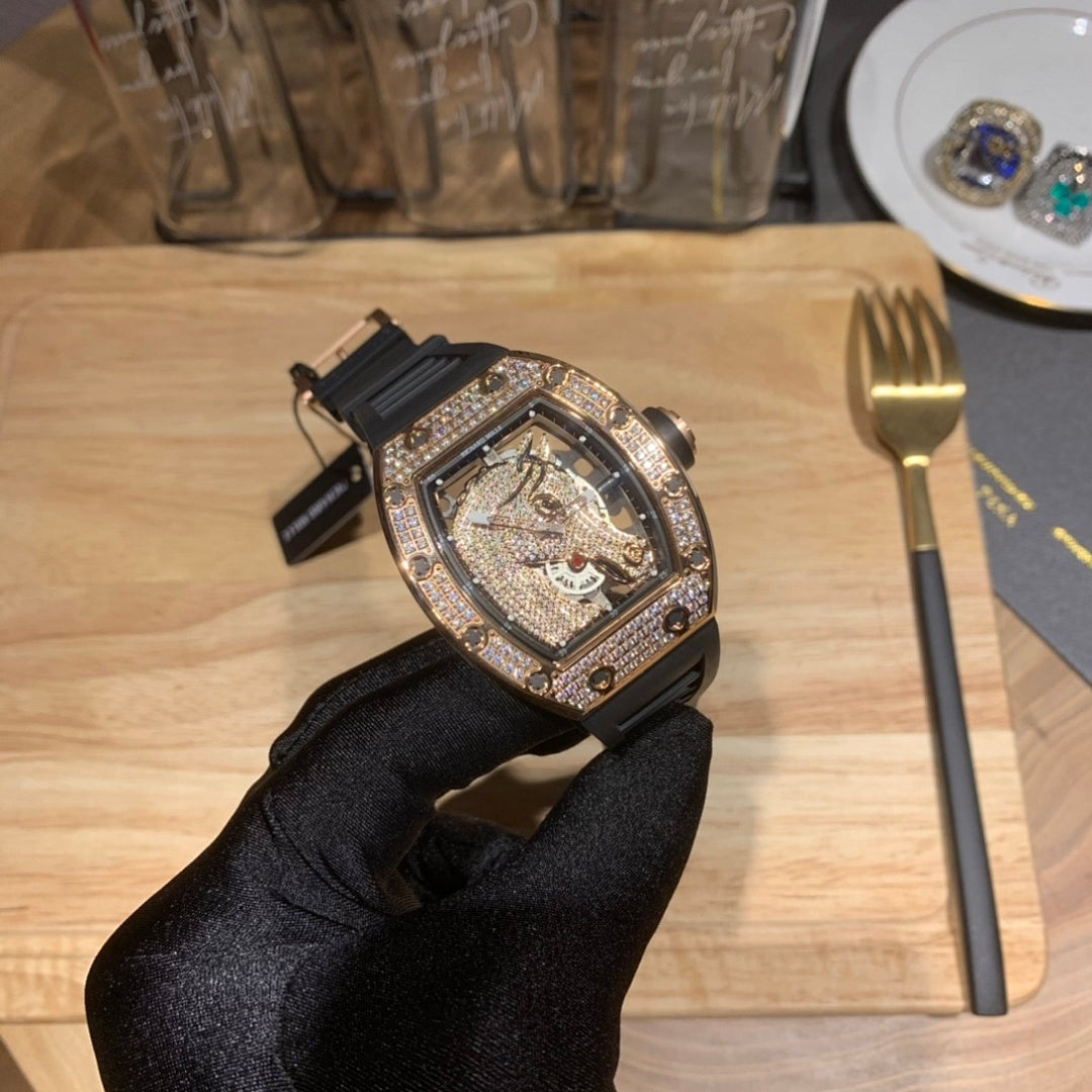 Luxury skeleton watch with black rubber strap, diamond-set case, openwork dial